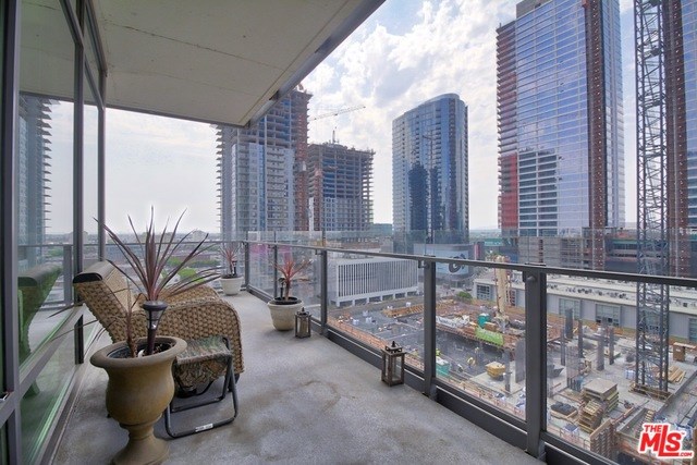 Two Bedroom Luxury Loft At Luma Features Wrap Around Balcony In A ...